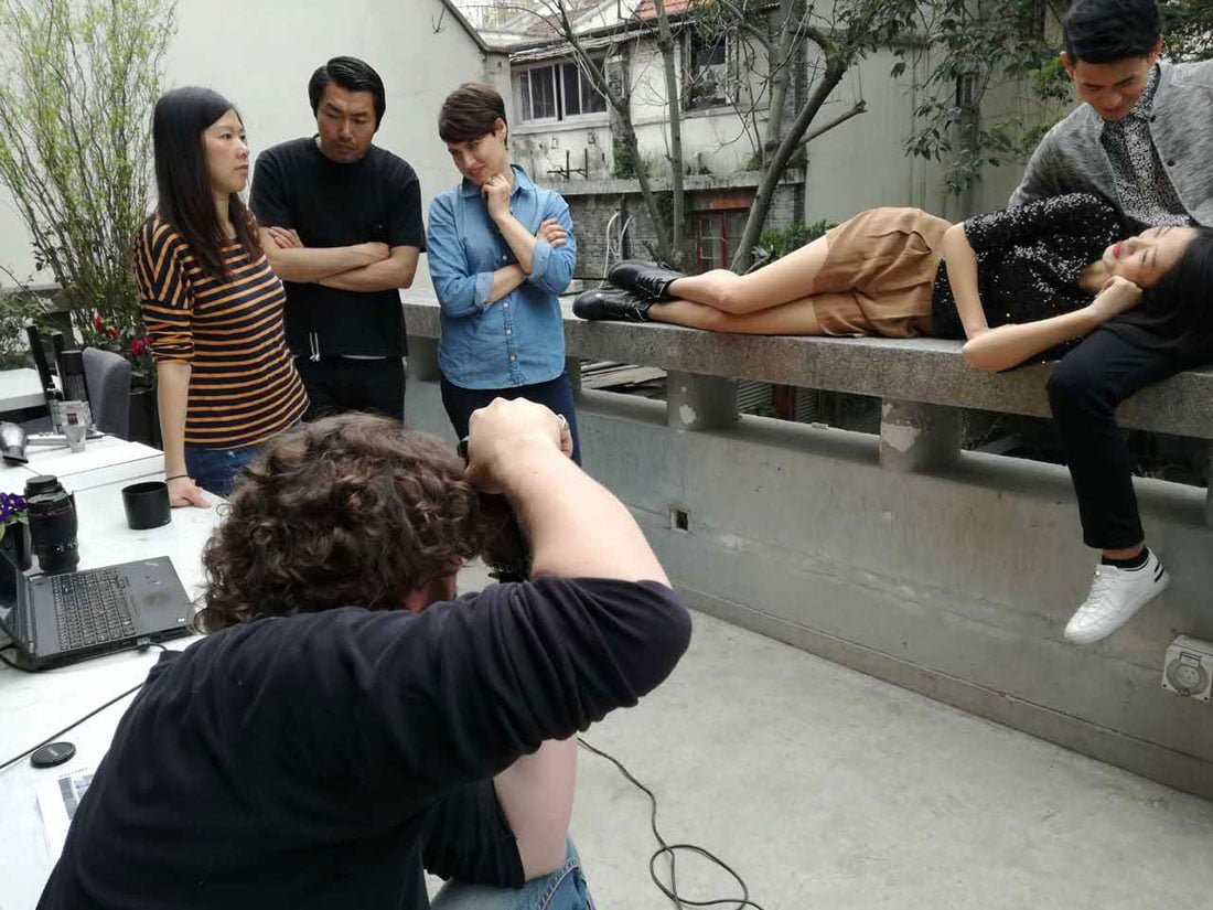 Behind the Scenes: Jeremy and Xiaohe posing for a fashion lifestyle editorial. Shanghai photo studio specialized in lifestyle photography.